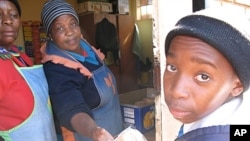 Bread is part of the lunch given to more than 100 at-risk students at the Reasoma high school in Soweto, South Africa