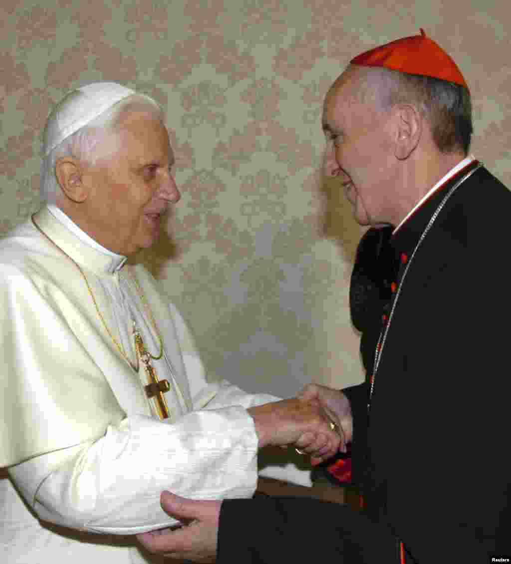 Then Pope Benedict greets then Archbishop of Buenos Aires Cardinal Jorge Mario Bergoglio at the Vatican, Jan. 13, 2007. 