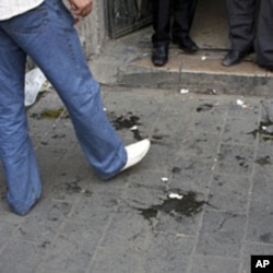 Eggs used by supporters of Syrian President Bashar Assad to pelt the US Ambassador, Robert Ford when he entered the office of an opposition member in Damascus litter the ground, September 29, 2011