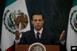 FILE - Mexico's President Enrique Pena Nieto speaks during a press conference at the Los Pinos presidential residence in Mexico City.