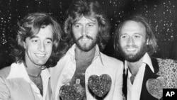 The British pop group the Bee Gees, from left, Robin Gibb, Barry Gibb and Maurice Gibb