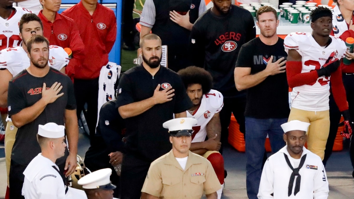 Kaepernick, NFL 49ers Teammate Kneel During US National Anthem