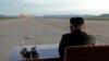 FILE - North Korean leader Kim Jong Un watches the launch of a Hwasong-12 missile in this undated photo released by North Korea's Korean Central News Agency, Sept. 16, 2017.