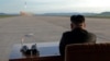 North Korean leader Kim Jong Un watches the launch of a Hwasong-12 missile in this undated photo released by North Korea's Korean Central News Agency, Sept. 16, 2017.