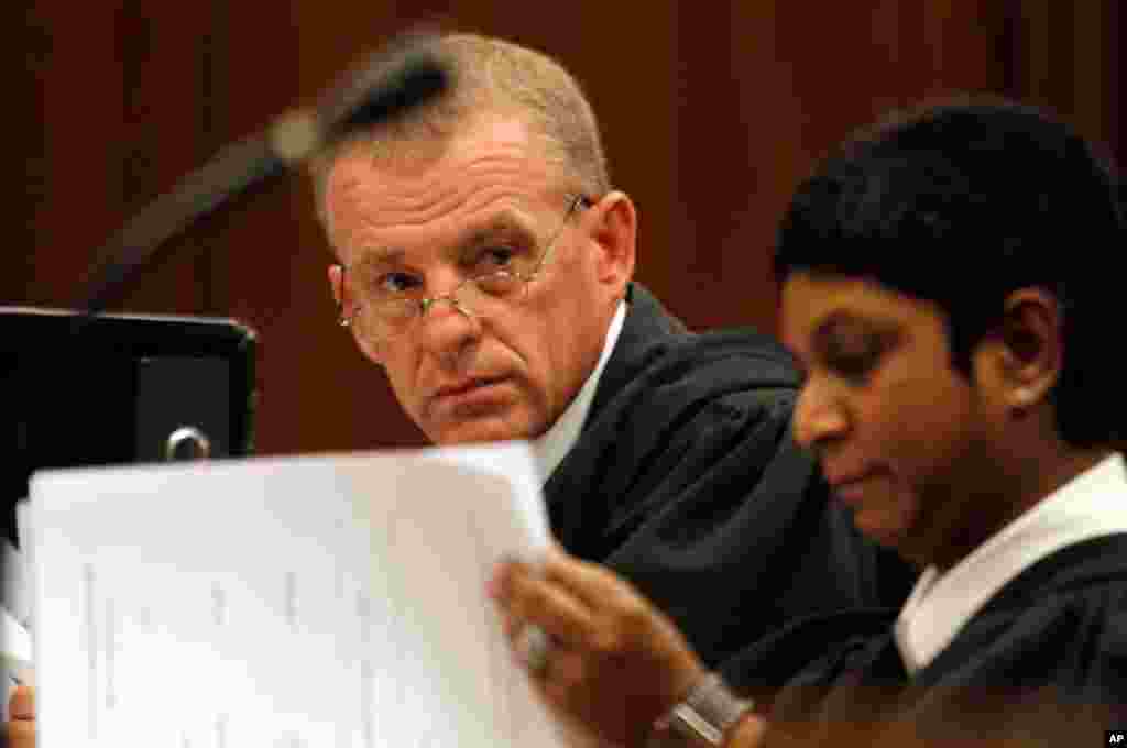 State prosecutor Gerrie Nel prepares for a hearing in the Pretoria, South Africa high court, March 28, 2013.