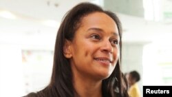 FILE - Isabel dos Santos, the daughter of Angolan President Jose Eduardo dos Santos and head of state energy giant Sonangol, speaks during an interview in Luanda, Angola, June 9, 2016. 