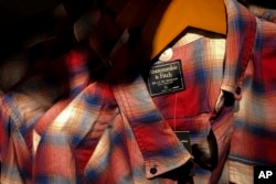 FILE - Clothing from American brand Abercrombie & Fitch, which was made in China, is seen for sale at a store in Beijing.