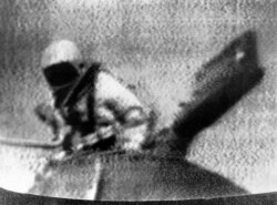 Soviet cosmonaut Alexey Leonov exits Soviet spacecraft Voskhod 2, becoming the first person to walk in space, in an Image from television. (AP Photo)
