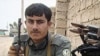 Phe chủ chiến Afghanistan đầu độc cảnh sát, tấn công chốt kiểm soát