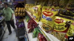 Packaged food with "Maggi" sign on it are displayed at a grocery store in Bangalore, India, June 5, 2015.