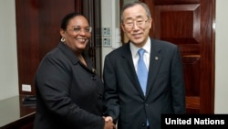 FILE - Former Secretary-General Ban Ki-moon meets with Mia Mottley, then-acting prime minister of Barbados, in Bridgetown, Barbados, Aug. 3, 2007.