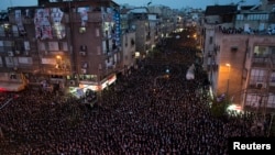 Ultra-Orthodox Jews take part in a rally supporting the United Torah Judaism party in Bnei Brak near Tel Aviv, March 11, 2015.