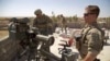 عراق: امریکی قیادت والے اتحاد کا افواج کی تعداد میں کمی لانے کا فیصلہ