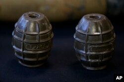 Hand grenades are on display at the Iranian Materiel Display (IMD) at Joint Base Anacostia-Bolling, in Washington, Nov. 29, 2018. The Trump administration accused Iran of stepping up violations of a U.N. ban on arms exports by sending rockets and other weaponry to rebels in Afghanistan and Yemen.