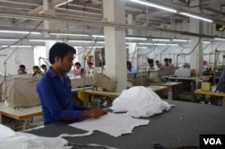 Wages of garment workers are higher than in some other industries. (A. Pasricha/VOA)