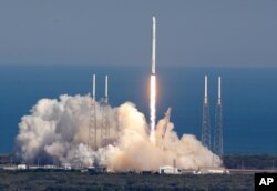 FILE - The SpaceX Falcon 9 rocket lifts off from launch complex 40 at the Kennedy Space Center in Cape Canaveral, Florida, April 8, 2016.