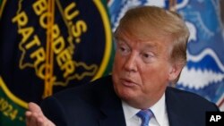 FILE - President Donald Trump participates in a round-table on immigration and border security at the U.S. Border Patrol Calexico Station in Calexico, Calif., April 5, 2019.