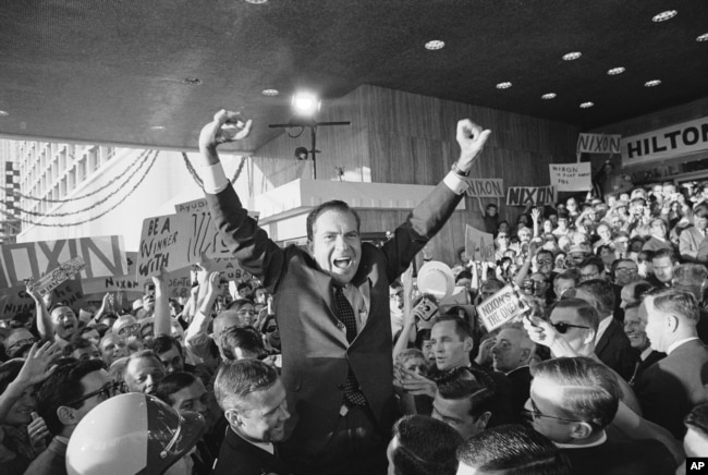 FILE - Richard Nixon makes his first public appearance in Miami Beach Aug. 5, 1968. The Republican National Convention selected Nixon as the nominee for president. (AP Photo)