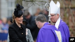 Sophie The Countess of Wessex is greeted by the Dean of Leicester Dean David Monteith, middle, and the Bishop of Leicester Tim Stevens, right, on arrival at Leicester Cathedral to attend a service for the re-reinterment of the mortal remains of Richard II