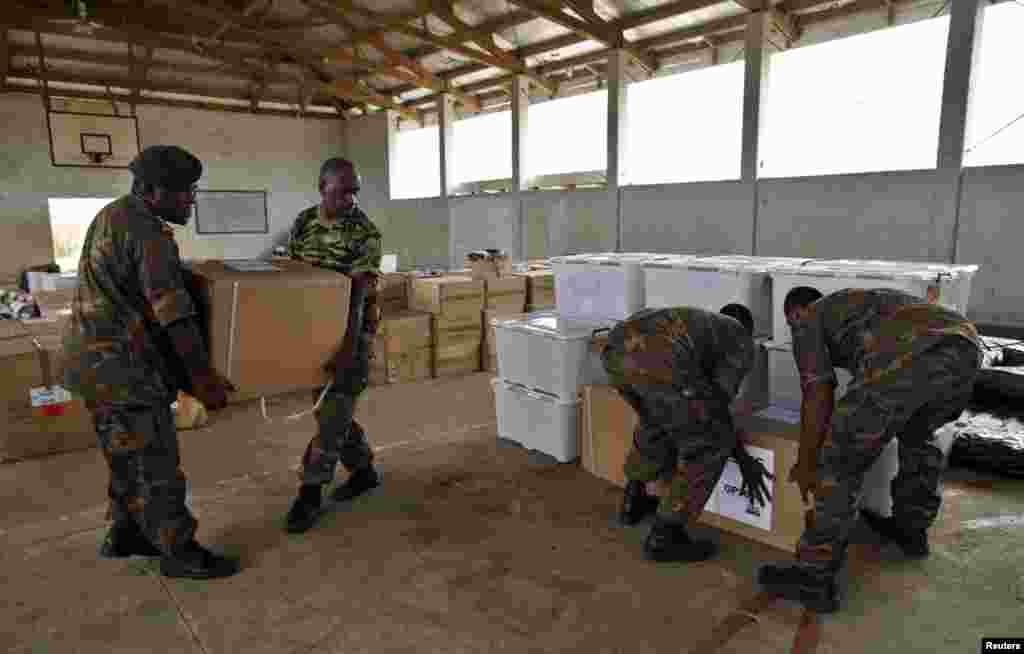 Vanuatu Mobile Force personnel unload generators from Australia days after Cyclone Pam in Port Vila, capital city of the Pacific island nation of Vanuatu, March 19, 2015.