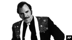 FILE - This 1980 file photo originally provided by Epic Records shows Country singer Slim Whitman. 