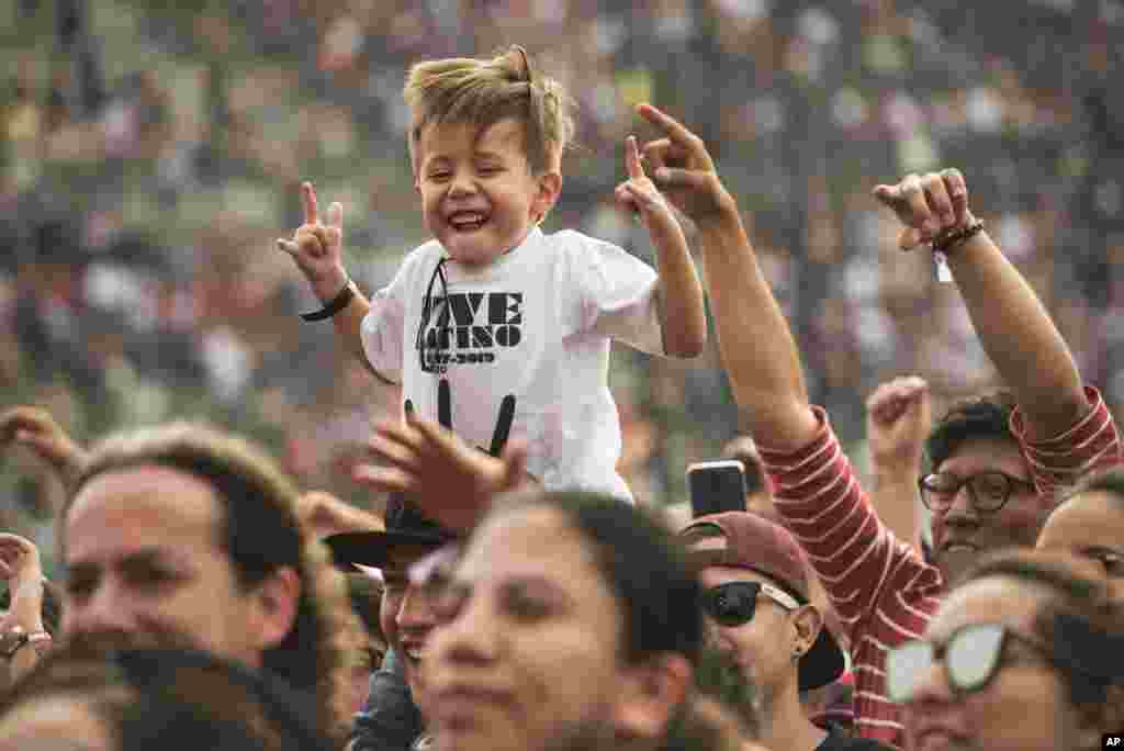 A young person attends the Vive Latino music festival in Mexico City, March 17, 2019. The two-day rock festival is one of the most important and longest-running music events in Mexico.