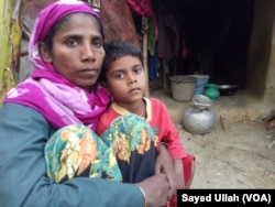 Noor Ayesha, 40, and her daughter at an illegal Rohingya settlement in Bangladesh.