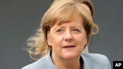 Njemačka kancelarka Angela Merkel stiže na sastanak pred početak samita evropskih lidera u Briselu, 19. oktobar 2017.