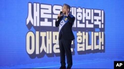 Gyeonggi Governor Lee Jae-myung, one of the ruling Democratic Party's contenders for next year's presidential election, speaks during the final campaign to choose the presidential election candidate in Seoul, South Korea, Oct. 10, 2021.