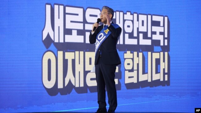 Gyeonggi Governor Lee Jae-myung, one of the ruling Democratic Party's contenders for next year's presidential election, speaks during the final campaign to choose the presidential election candidate in Seoul, South Korea, Oct. 10, 2021.