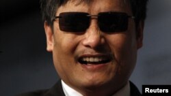 Blind activist Chen Guangcheng smiles during an appearance at the Council on Foreign Relations in New York City, May 31, 2012. 