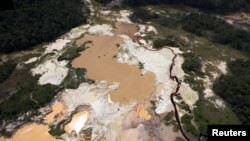 An aerial view of the environmental damage caused by illegal mining at the Canaima National Park in southern Bolivar State June 17, 2010. Venezuela's army has evicted thousands from makeshift towns in one of the world's most pristine jungles, where wildca