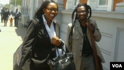 Artist Owen Maseko and lawyer Nosimilo Chanayiwa leaving the Constitutional Court on Wednesday afternoon. (Photo/Iwrin Chifera)