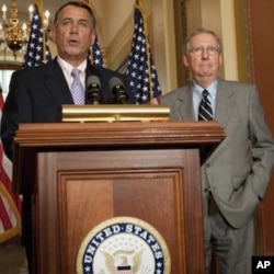 US Speaker of the House John Boehner (L) and US Senate Minority Leader Mitch McConnell hold a press conference on July 30, 2011 at the US Capitol in Washington, DC.