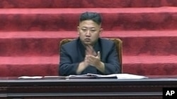 FILE - North Korean leader Kim Jong Un claps hands during the Supreme People's Assembly's second meeting of the year, in Pyongyang, North Korea, Sept. 25, 2012.