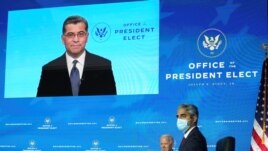 U.S. President-elect Joe Biden and Dr. Vivek Murphy, U.S. President-elect Joe Biden's nominee to be U.S. Surgeon General, listen as Dr. Xavier Becerra, Biden's nominee to be Health and Human Services (HHS) secretary, addresses a news conference via video