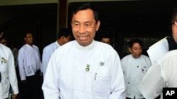 Myanmar's Parliament speaker Shwe Mann leaves after a press conference at the Union Solidarity and Development Party headquarters in Naypyitaw, Myanmar, Aug. 12, 2015.