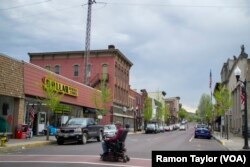 A resident of Danville, Pennsylvania crosses Mill Street, one of the town’s main roads.