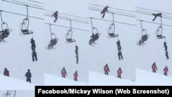Mickey Wilson climbed a tower and crawled along a cable to help save another skier's life.