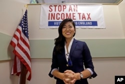 FILE - Jinyoung Englund, Republican candidate for 45th district Senate seat in Washington state, poses for a portrait at her campaign headquarters in Woodinville, Wash., Aug. 22, 2017.