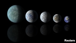 Relative sizes of Kepler habitable zone planets discovered as of April 18, 2013 in this artist's rendition provided by NASA. (L to R) Kepler-22b, Kepler-69c, Kepler-62e, Kepler 62f and Earth. 