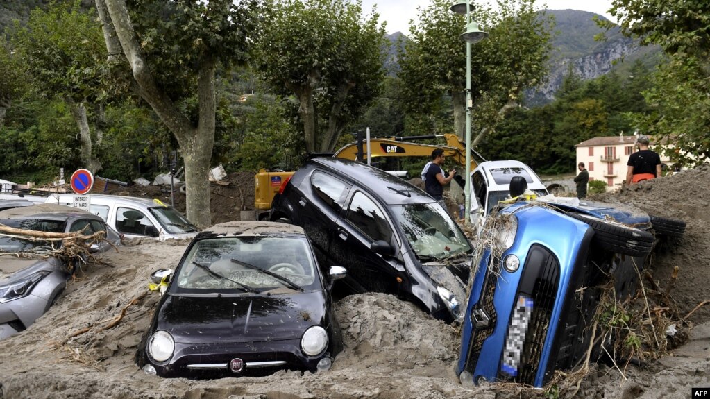 This general view shows a pile of vehicles on a street in Breil-sur-Roya, south-eastern France, on October 4, 2020, after extensive flooding caused widespread damage in the Alpes-Maritimes departement.
