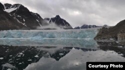 Glaciers on western Svalbard have been retreating for at least the past 100 years. The lake in the foreground can be used to study past changes in glacier activity. (Credit: William D'Andrea)