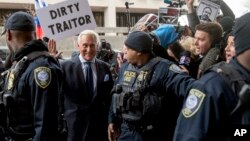 Former campaign adviser for President Donald Trump, Roger Stone arrives at Federal Court, Jan. 29, 2019, in Washington. 