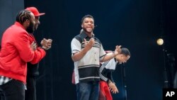 This image provided by Thoughts of a Colored Man shows Luke James, from left, Bjorn DuPaty, playwright Keenan Scott II, and Tristan Mack Wilds performing in "Thoughts of a Colored Man" on Dec. 21, 2021 in New York.