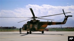 This May 13, 2013 file photo shows a Mi-17 helicopter, used by the Afghan air force sitting on Bagram Air Field in Afghanistan. It is one type of helicopter Nigeria is buying from Russia. 
