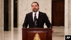  FILE - Lebanese Prime Minister Saad Hariri speaks to journalists at the presidential palace in Baabda, east of Beirut, Lebanon, Nov. 3, 2016.