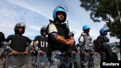 FILE - U.N. peacekeepers are seen at an IDP (internally displaced persons) camp in the United Nations Mission In South Sudan (UNMISS) base in Juba May 6, 2014.