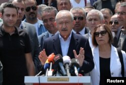 Kemal Kilicdaroglu, leader of main opposition Republican People's Party (CHP), talks to the media after casting his ballot at a polling station in Ankara, Turkey, June 24, 2018.