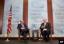 CIA Director Mike Pompeo, right, answers question while speaking at the Center for Strategic and International Studies In Washington, April 13, 2017. Also on stage is Juan Zarate, senior adviser at CSIS.